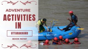 Tourists enjoying river rafting adventure in Uttarakhand on the Ganga River