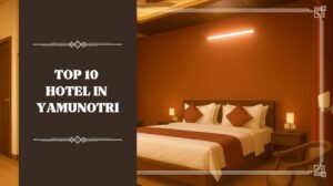 Luxury hotel room interior in Yamunotri with warm lighting and modern decor — representing top hotels for Char Dham Yatra stays.