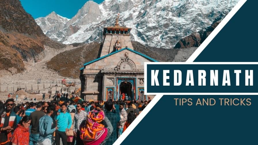 Kedarnath Temple surrounded by devotees and Himalayan mountains